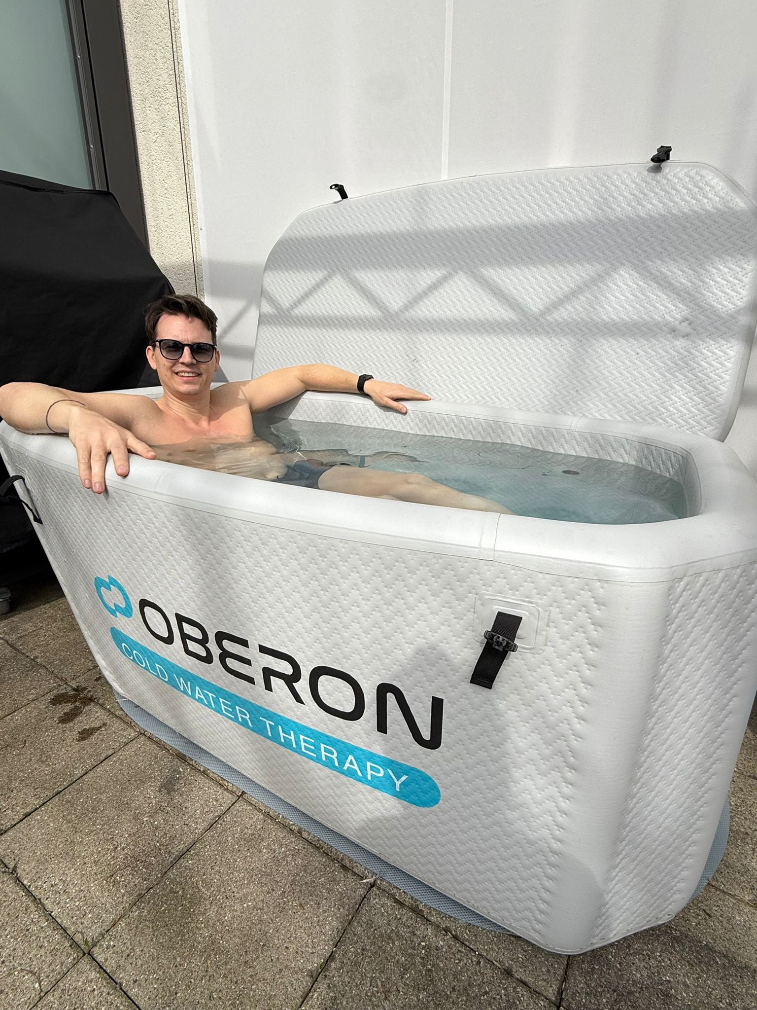 Person relaxing in a OBERON Incline Ice Bath Pro